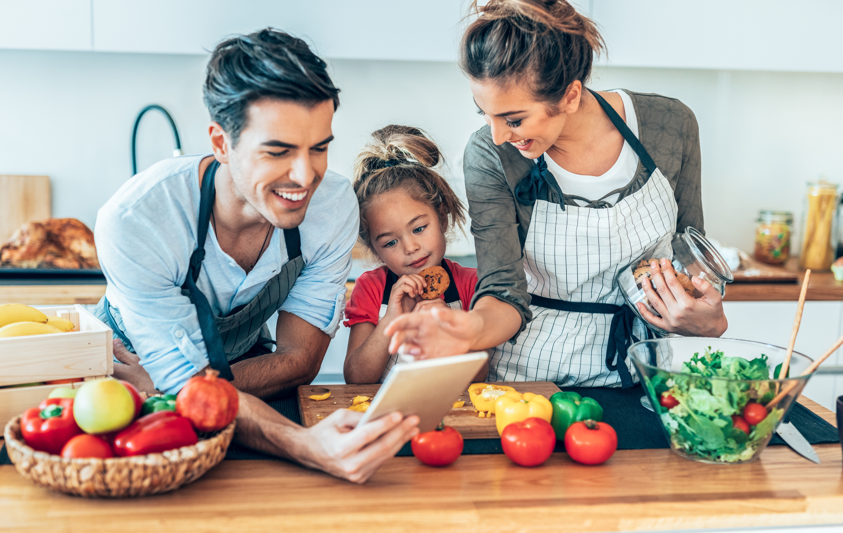 Young family cooking